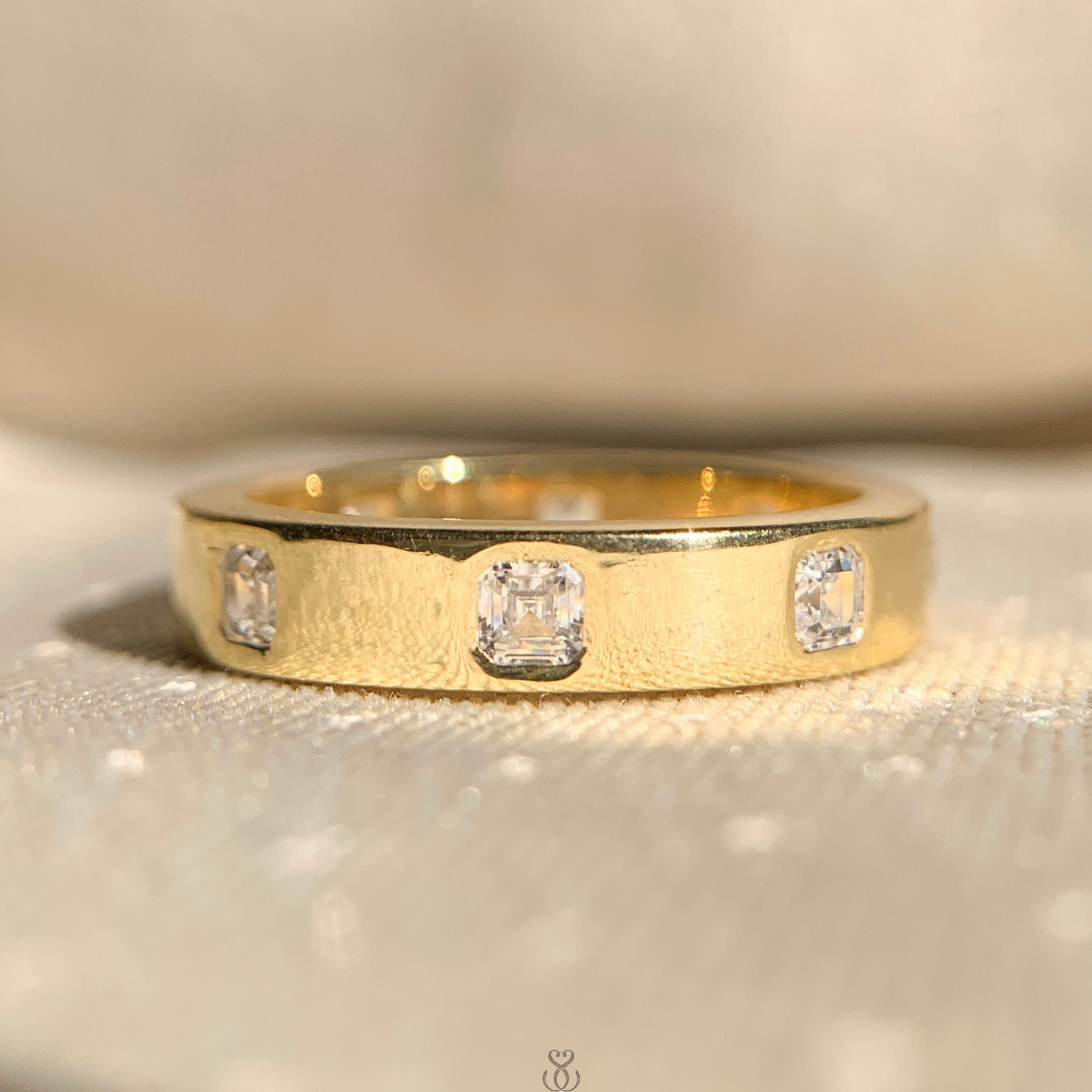 "Lab grown Asscher cut diamond eternity band in 14k white gold"